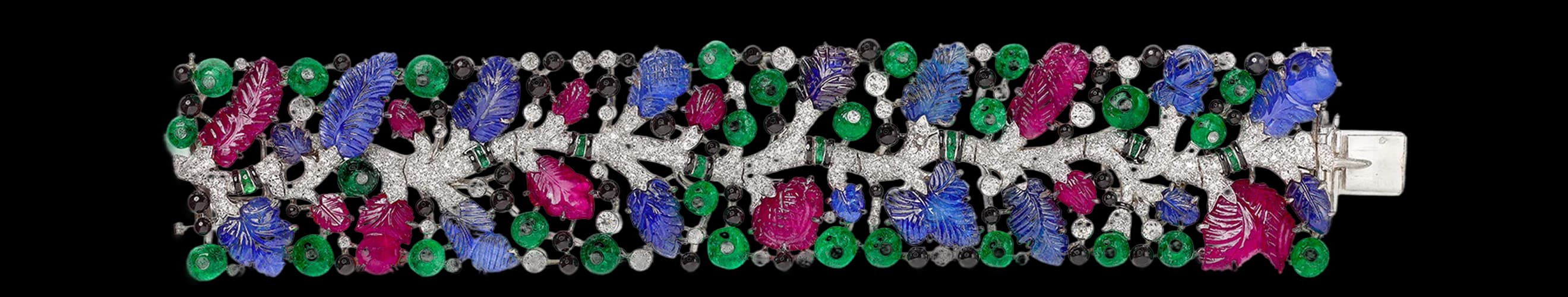Браслет Cartier Tutti Frutti из платины с бриллиантами, сапфирами, изумрудами и рубинами, 1925
