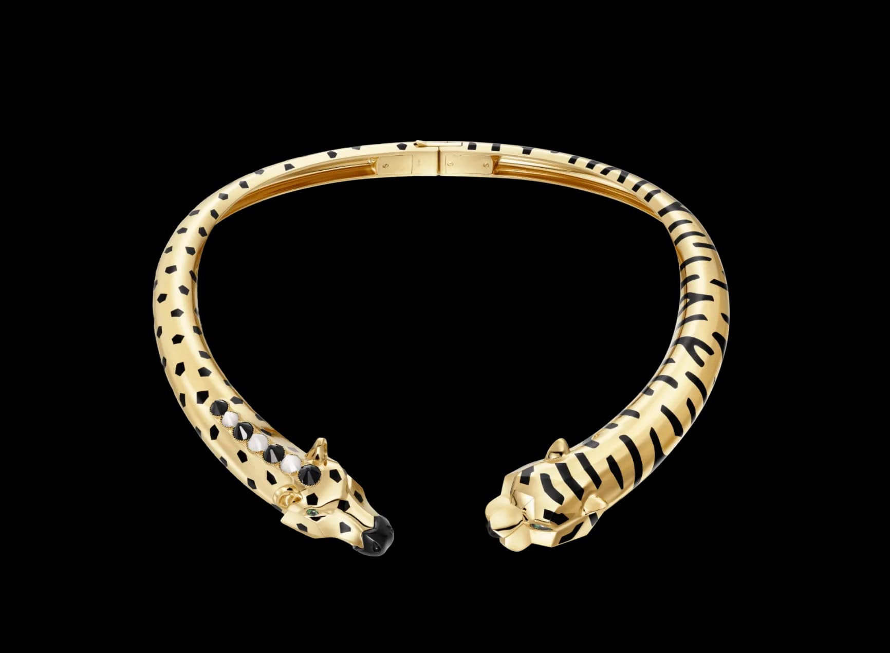 Колье Indomptables de Cartier из желтого золота с цаворитами, лунным камнем и ониксами