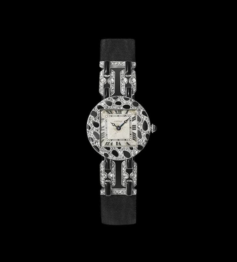Часы Cartier из платины с бриллиантами и ониксами, на которых впервые появился мотив Panthère, 1914